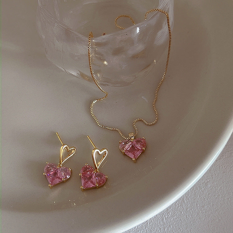 Wholesale Romantic heart-shaped peach pink earrings, fresh and sweet, simple and cool, super shiny earrings